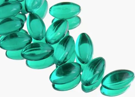 Light green gel capsule pills
